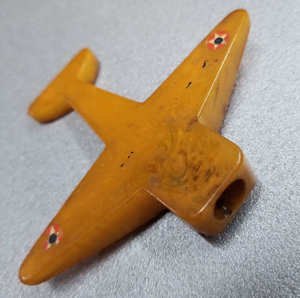 Vintage Bakelite Pencil Sharpener Orange Butterscotch Plane USA Military WWII